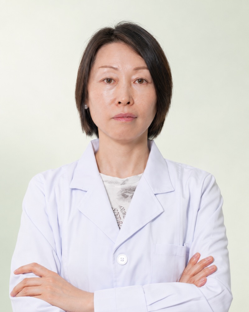 Portrait of Wu Xiaoling in a white coat